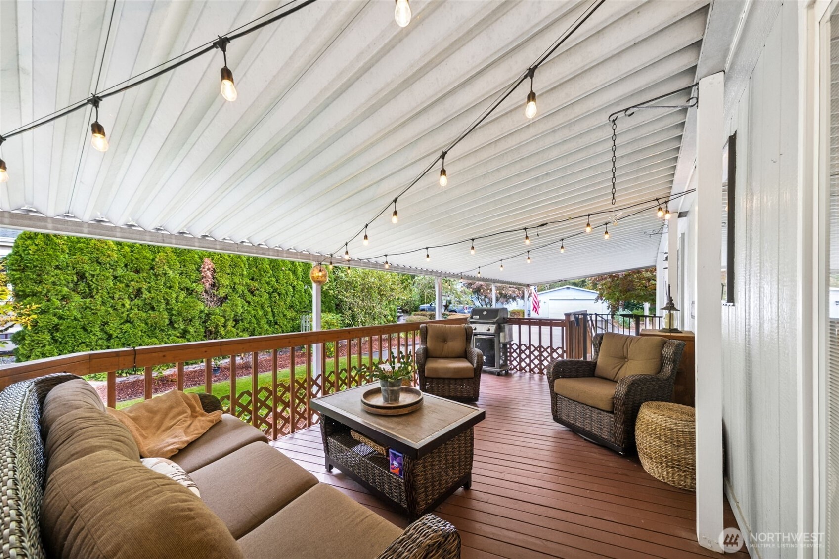 2350 Rincon Avenue Enumclaw, WA 98022 - Photo 26 of 31 a balcony with furniture and wooden floor