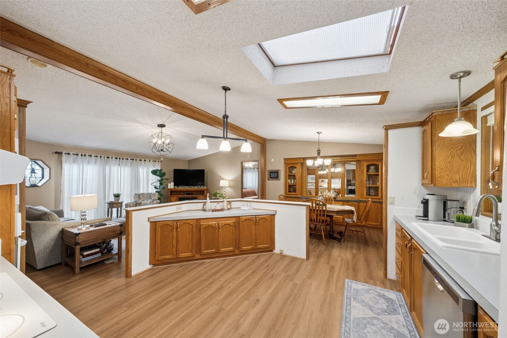 2350 Rincon Avenue Enumclaw, WA 98022 - Photo 10 of 31 a kitchen with lots of counter top space and living room