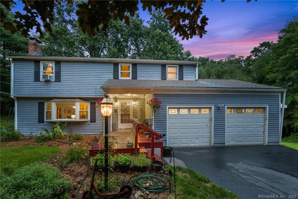 83 Barbourtown Road Canton, CT 06019 - Photo 1 of 1 a front view of a house with garden