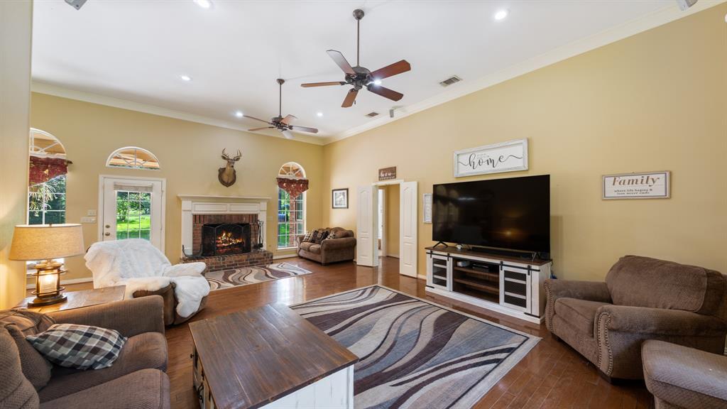 875 Arnold Paul Road Canton, TX 75103 - Photo 6 of 32 a living room with furniture and a flat screen tv