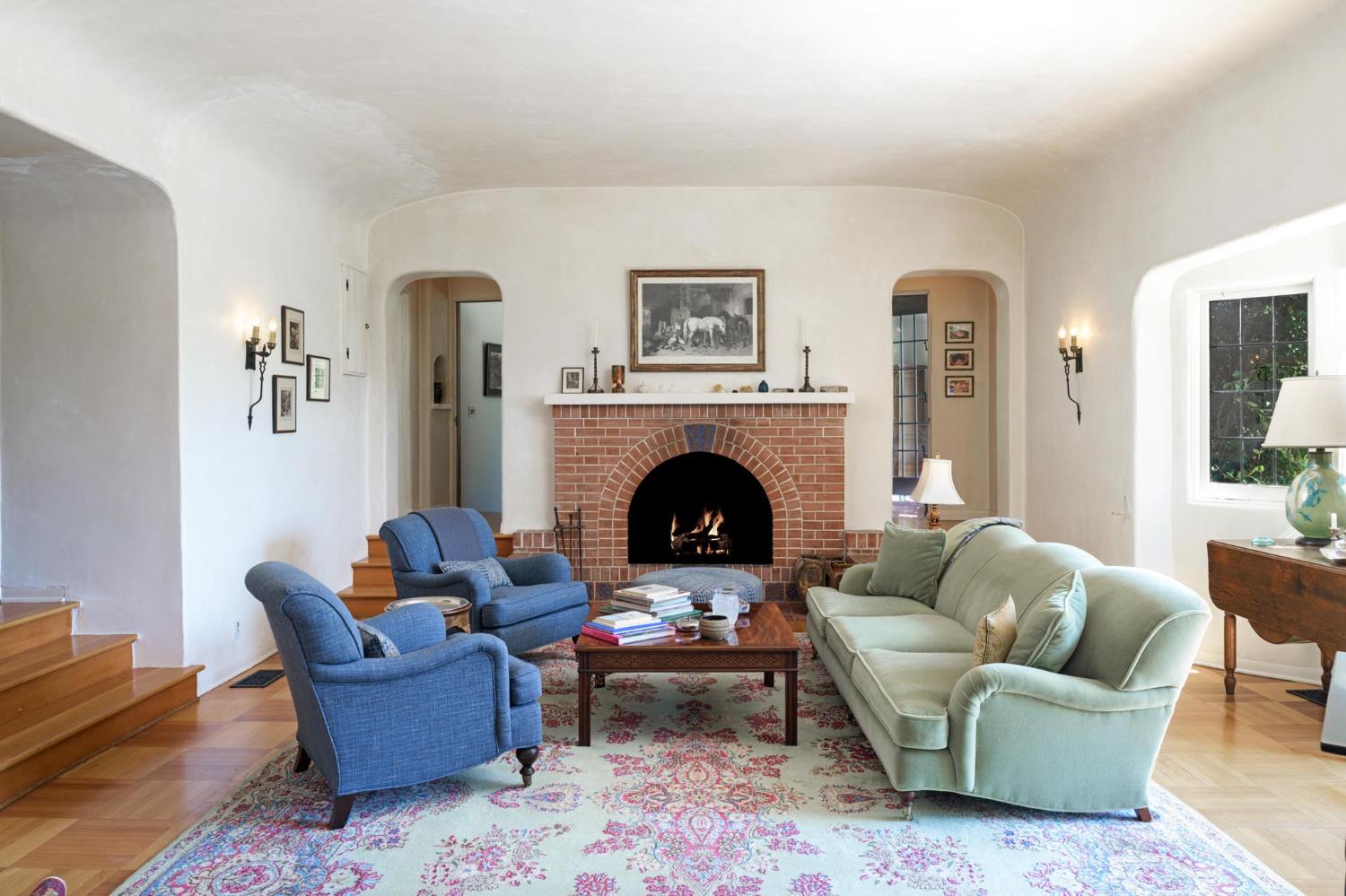 520 Foothill Road Ojai, CA 93023 - Photo 11 of 45 a living room with furniture and a fireplace