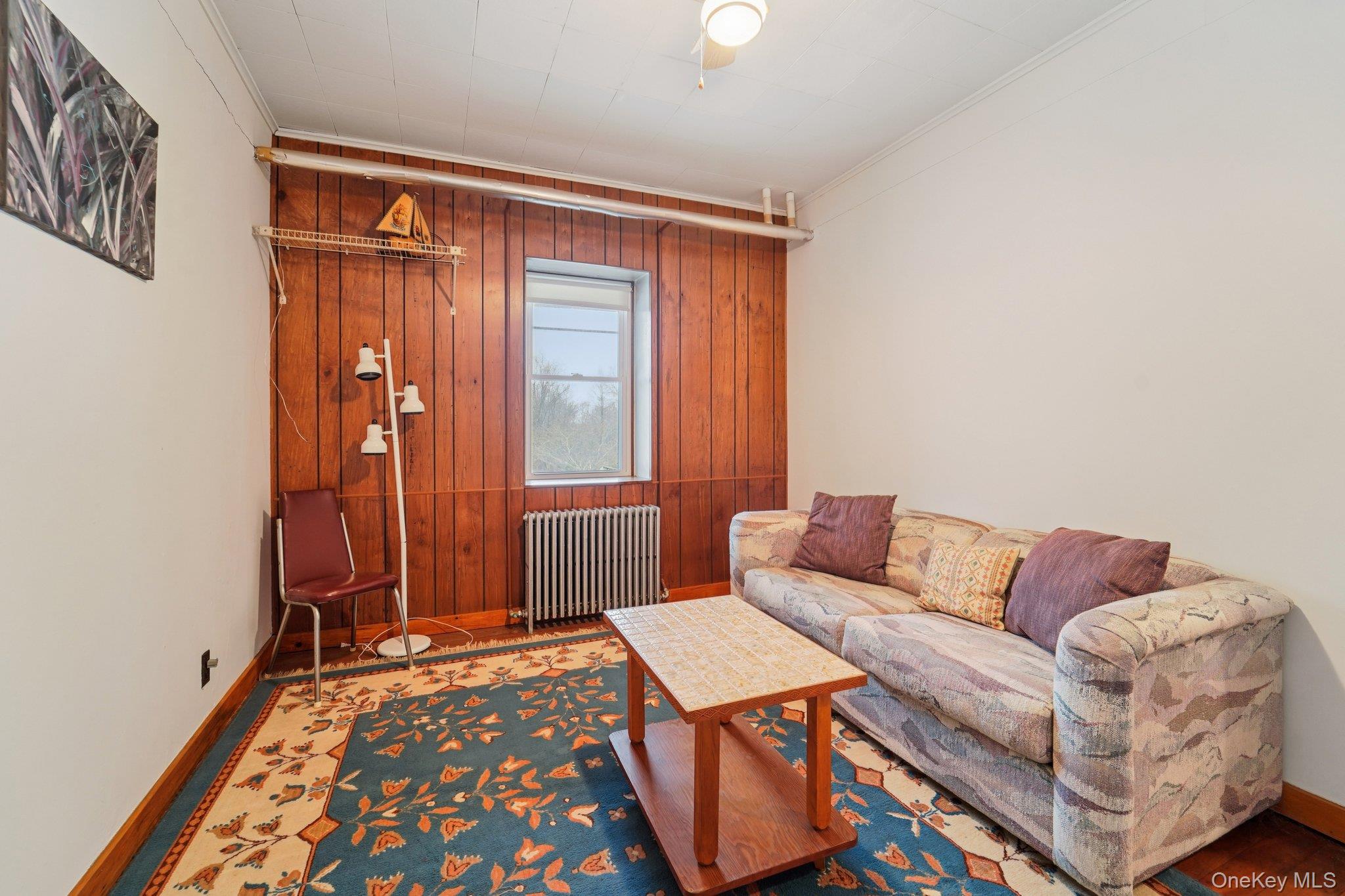 350 Barrett Hill Road Mahopac, NY 10541 - Photo 12 of 21 a living room with a couch and a dresser