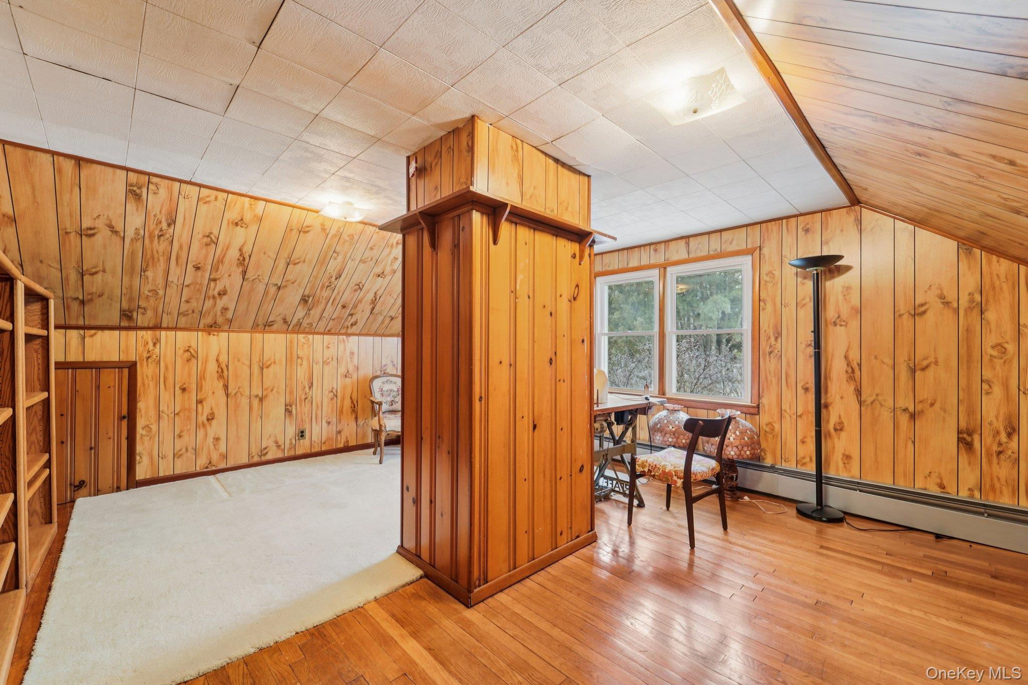 350 Barrett Hill Road Mahopac, NY 10541 - Photo 15 of 21 a view of an empty room with wooden floor and a window