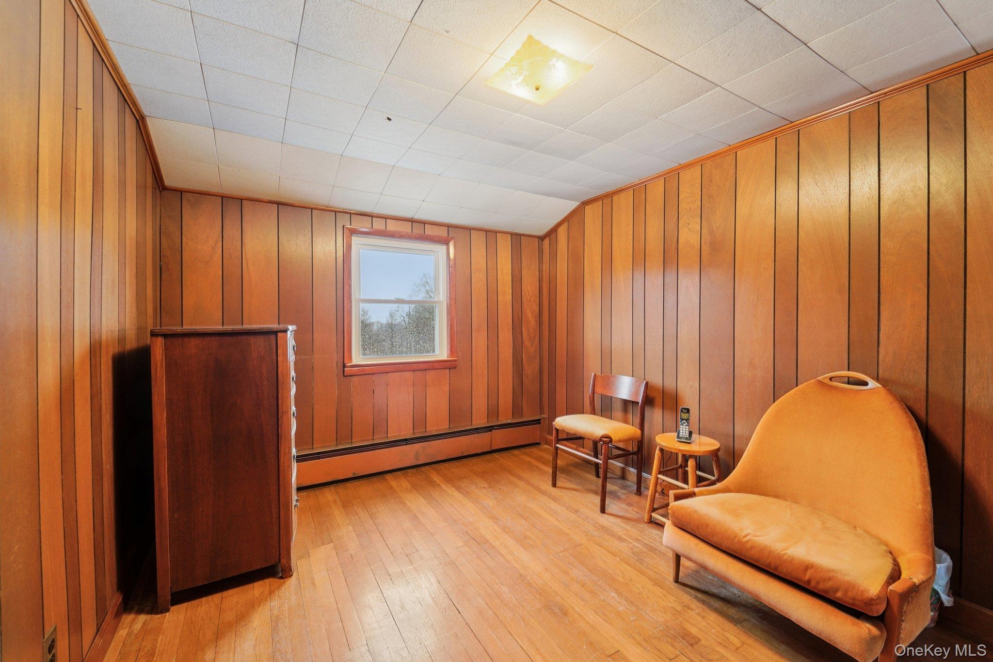 350 Barrett Hill Road Mahopac, NY 10541 - Photo 17 of 21 a living room with furniture and wooden floor