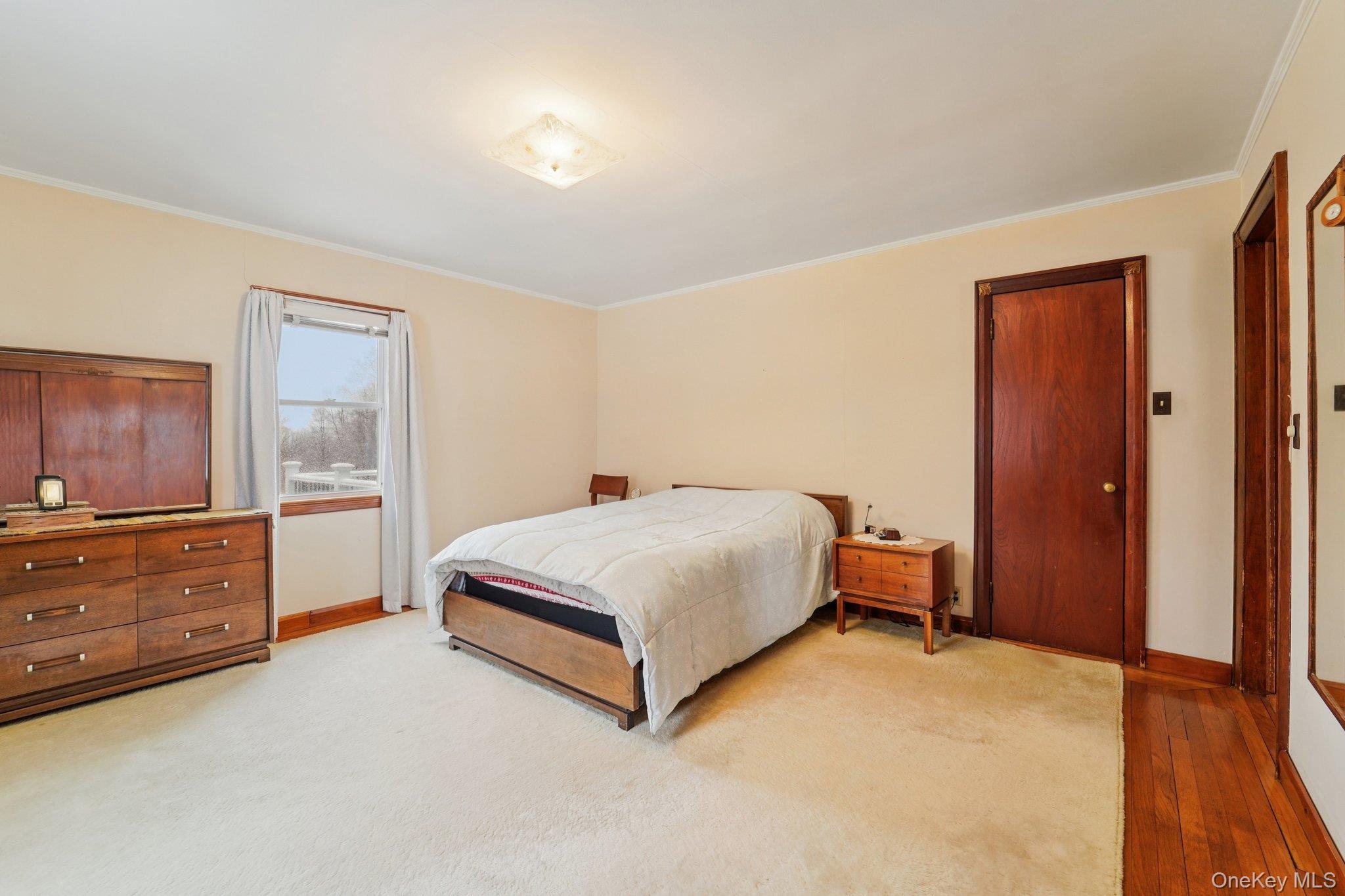 350 Barrett Hill Road Mahopac, NY 10541 - Photo 8 of 21 a bedroom with a bed and a dresser