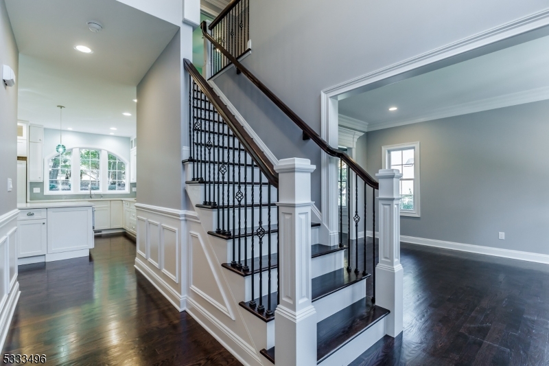 1831 Washington Valley Road Bridgewater, NJ 08836 - Photo 17 of 43 a view of entryway with wooden floor and stairs