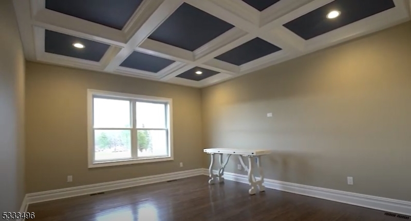 1831 Washington Valley Road Bridgewater, NJ 08836 - Photo 22 of 43 an empty room with wooden floor and windows