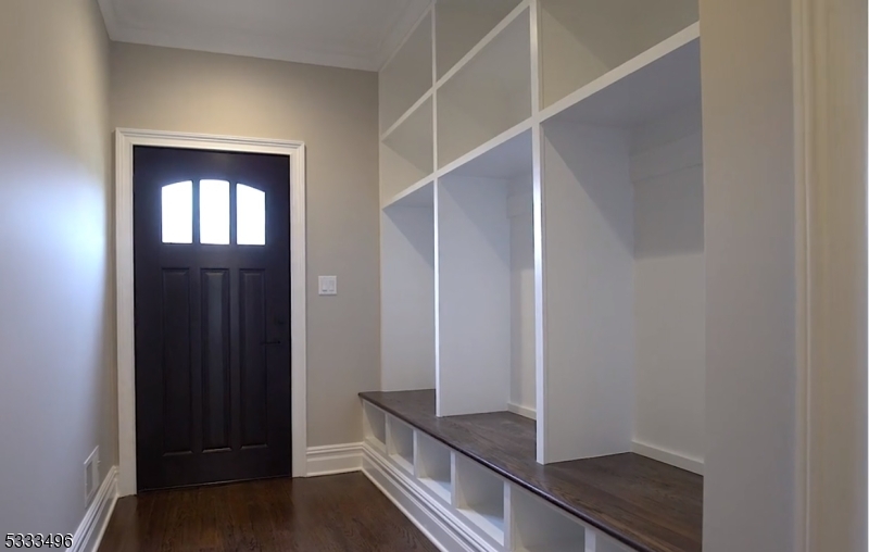 1831 Washington Valley Road Bridgewater, NJ 08836 - Photo 23 of 43 an entryway door with wooden floor