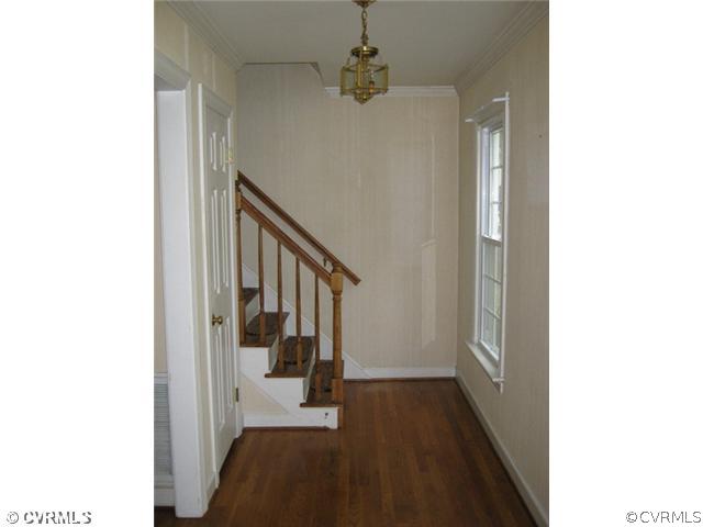 2506 Tanglebrook Road Midlothian, VA 23112 - Photo 3 of 11 a view of hallway with stairs and wooden floor