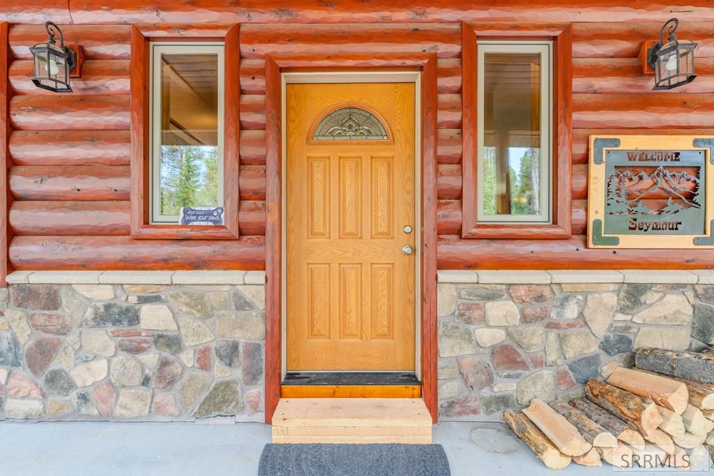 4030 Salt Lick Loop Road Island Park, ID 83429 - Photo 56 of 57 Rock accents with log siding