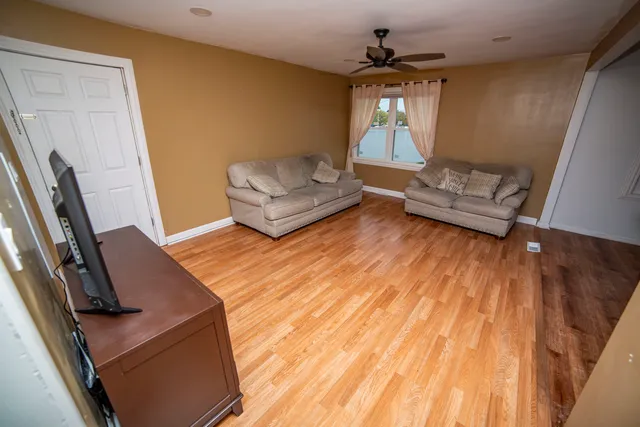 a living room with furniture and a window