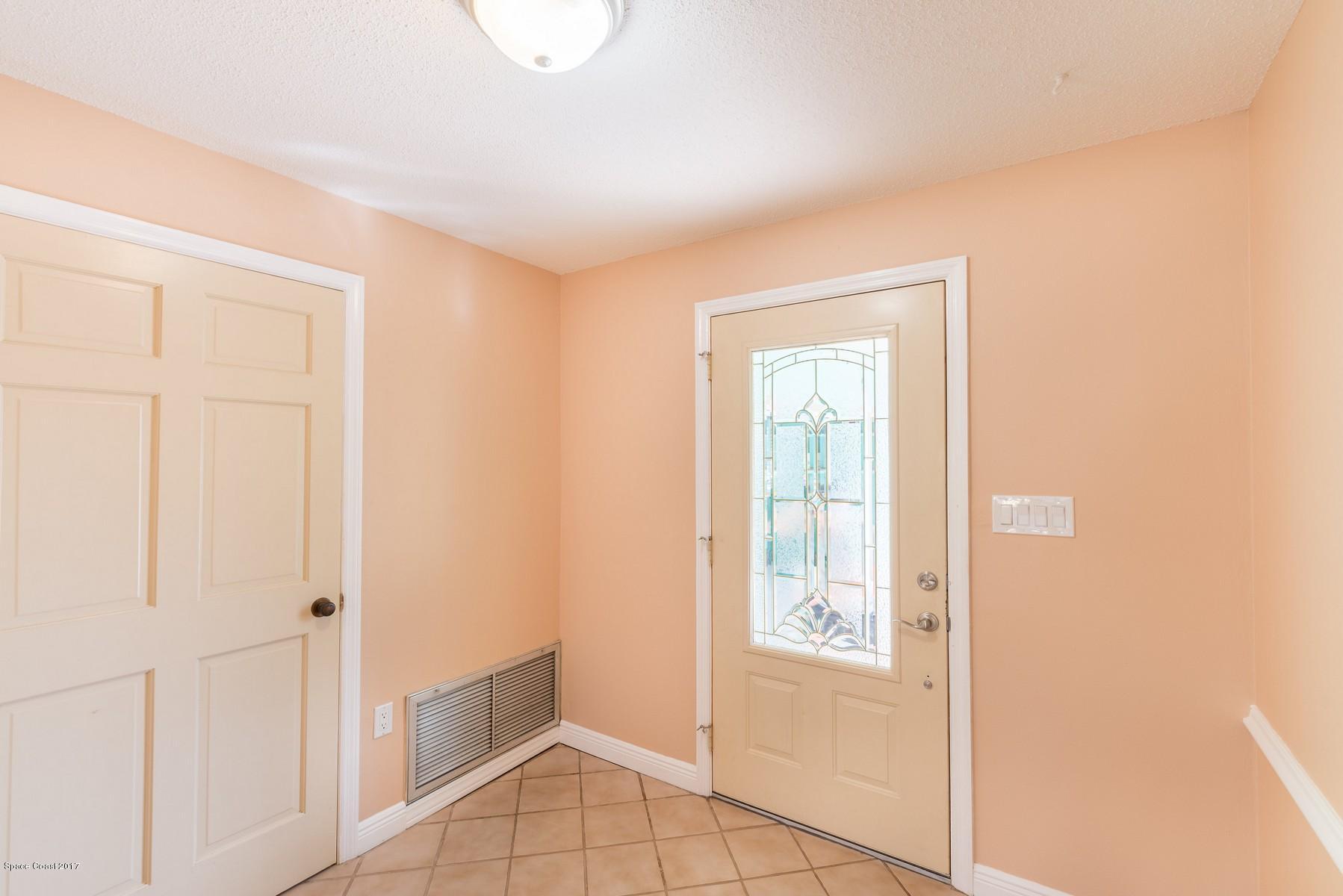 205 Bimini Road Cocoa Beach, FL 32931 - Photo 26 of 28 Front entrance