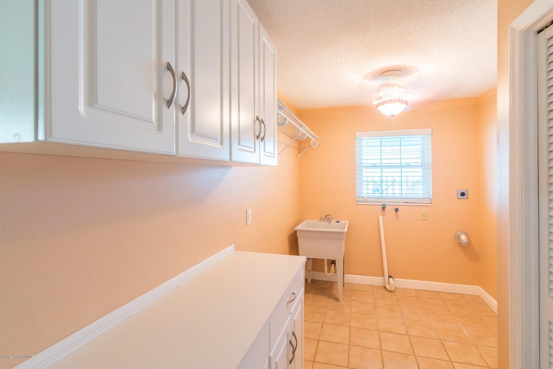 205 Bimini Road Cocoa Beach, FL 32931 - Photo 27 of 28 Laundry room