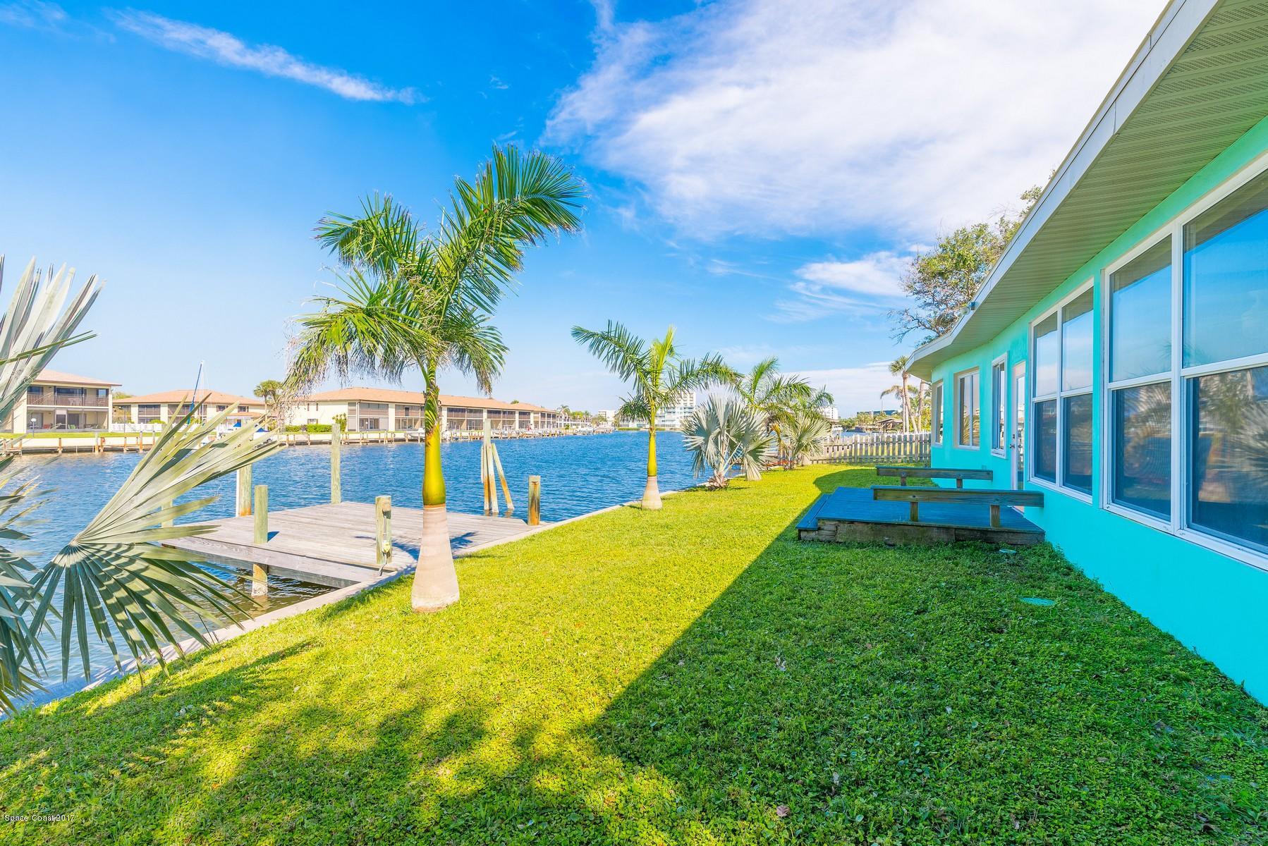 205 Bimini Road Cocoa Beach, FL 32931 - Photo 8 of 28 wide canal views
