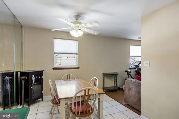 a bedroom with two beds and a closet