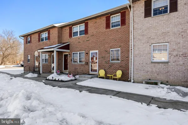 a front view of a house with patio
