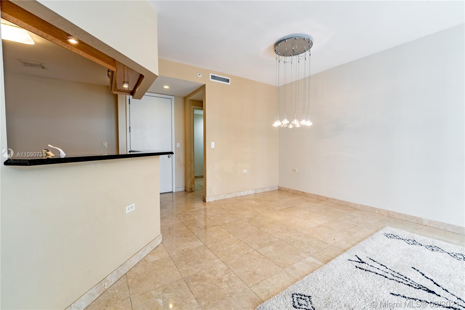 801 Brickell Key Boulevard, Unit 806 Miami, FL 33131 - Photo 13 of 20 a view of a room with an empty space