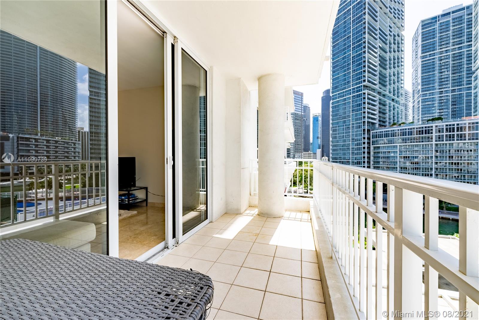 801 Brickell Key Boulevard, Unit 806 Miami, FL 33131 - Photo 6 of 20 a view of a balcony with wooden floor