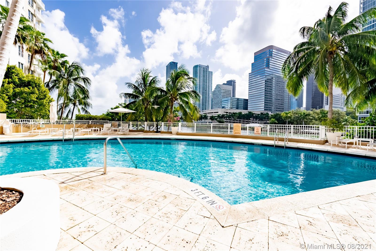 801 Brickell Key Boulevard, Unit 806 Miami, FL 33131 - Photo 7 of 20 a view of swimming pool with a yard