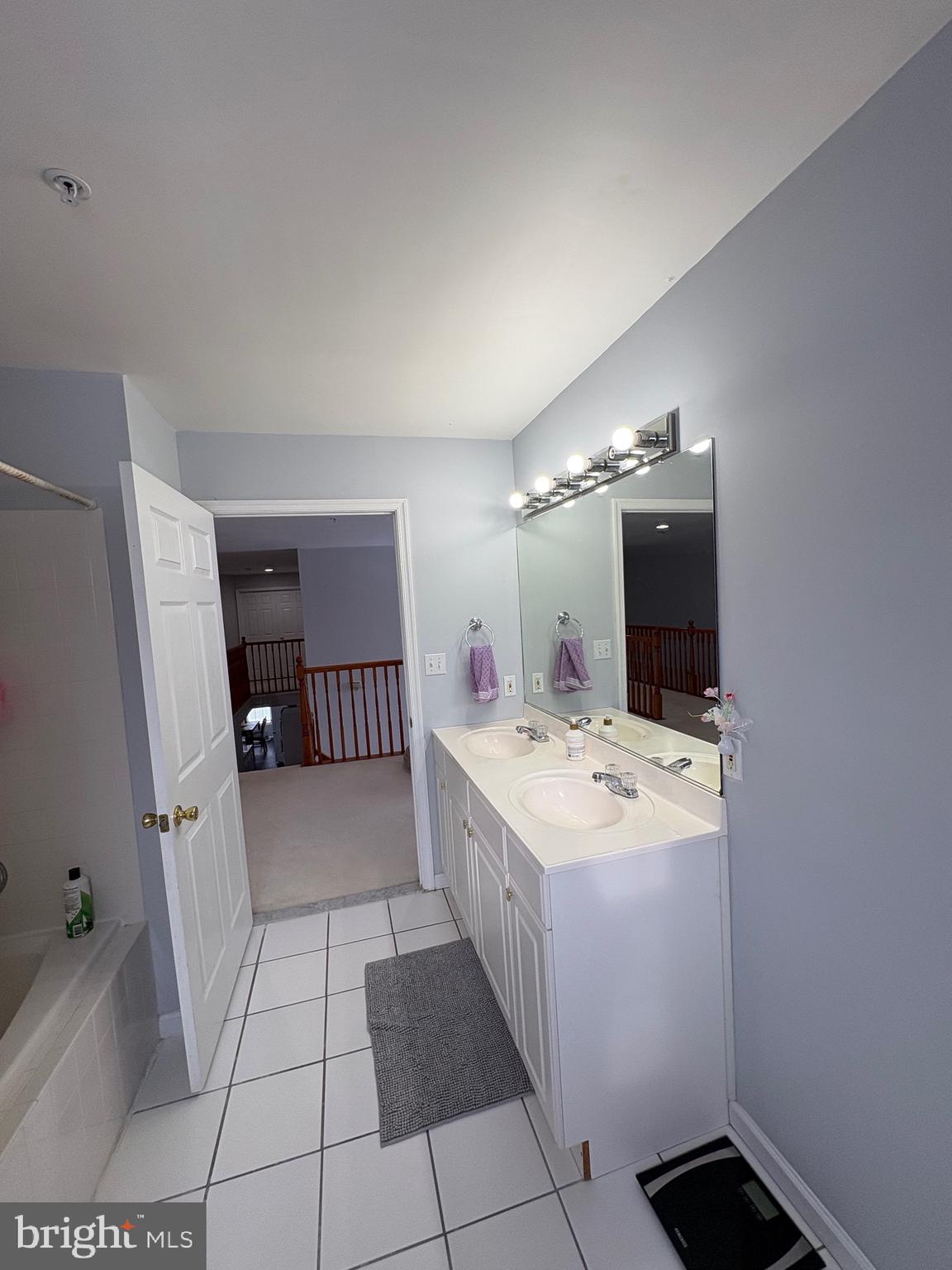 11105 Riverview Road Fort Washington, MD 20744 - Photo 12 of 25 a bathroom with a sink a toilet and a mirror