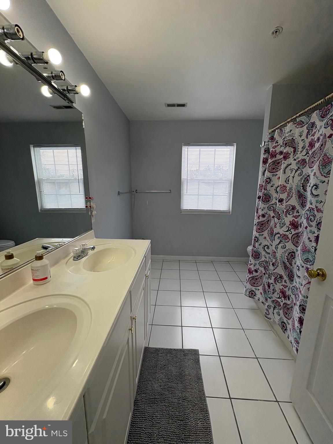 11105 Riverview Road Fort Washington, MD 20744 - Photo 15 of 25 a bathroom with a sink and a mirror
