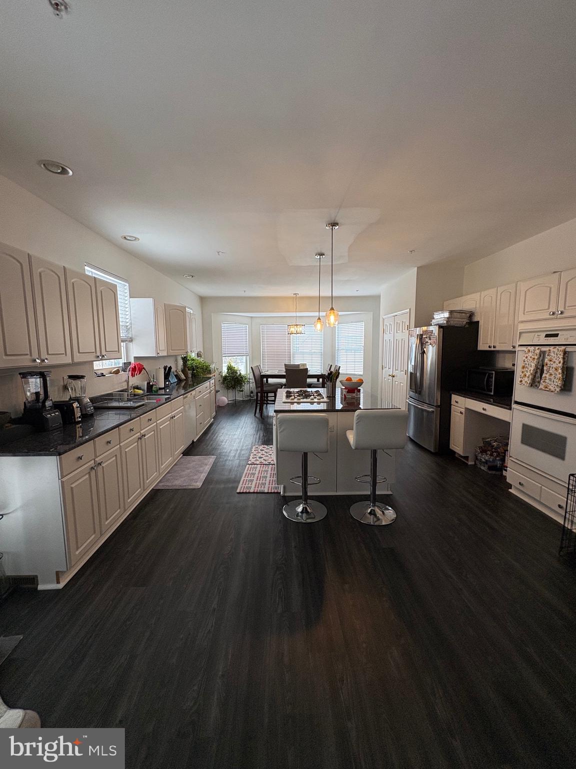 11105 Riverview Road Fort Washington, MD 20744 - Photo 23 of 25 a living room with furniture and kitchen view