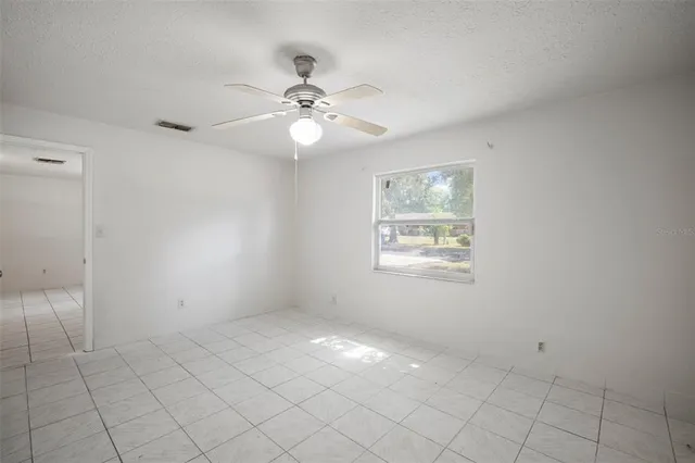 a bathroom with a sink a toilet and window