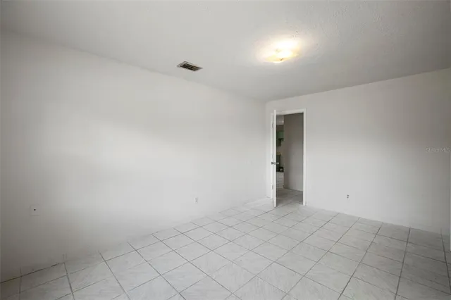 a view of an empty room with window