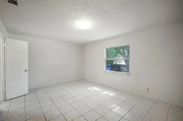 a bathroom with a sink toilet and mirror