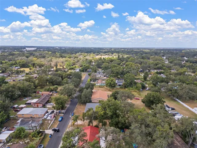 an aerial view of a city with lots of residential buildings