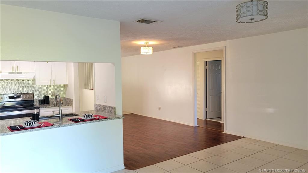 2149 Southeast Dolphin Road Port St. Lucie, FL 34952 - Photo 23 of 25 a view of a room with gym equipment