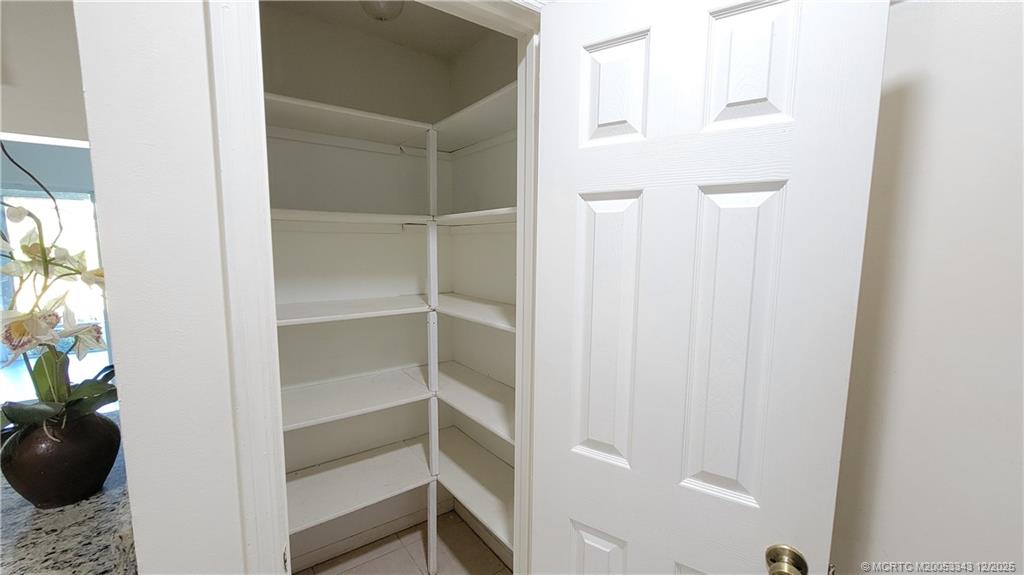 2149 Southeast Dolphin Road Port St. Lucie, FL 34952 - Photo 25 of 25 a view of a walk in closet