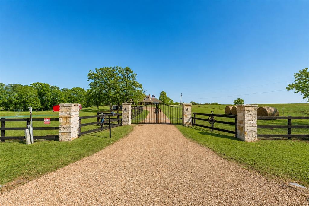669 VZ County Road Canton, TX 75103 - Photo 2 of 40 a view of a backyard with wooden fence