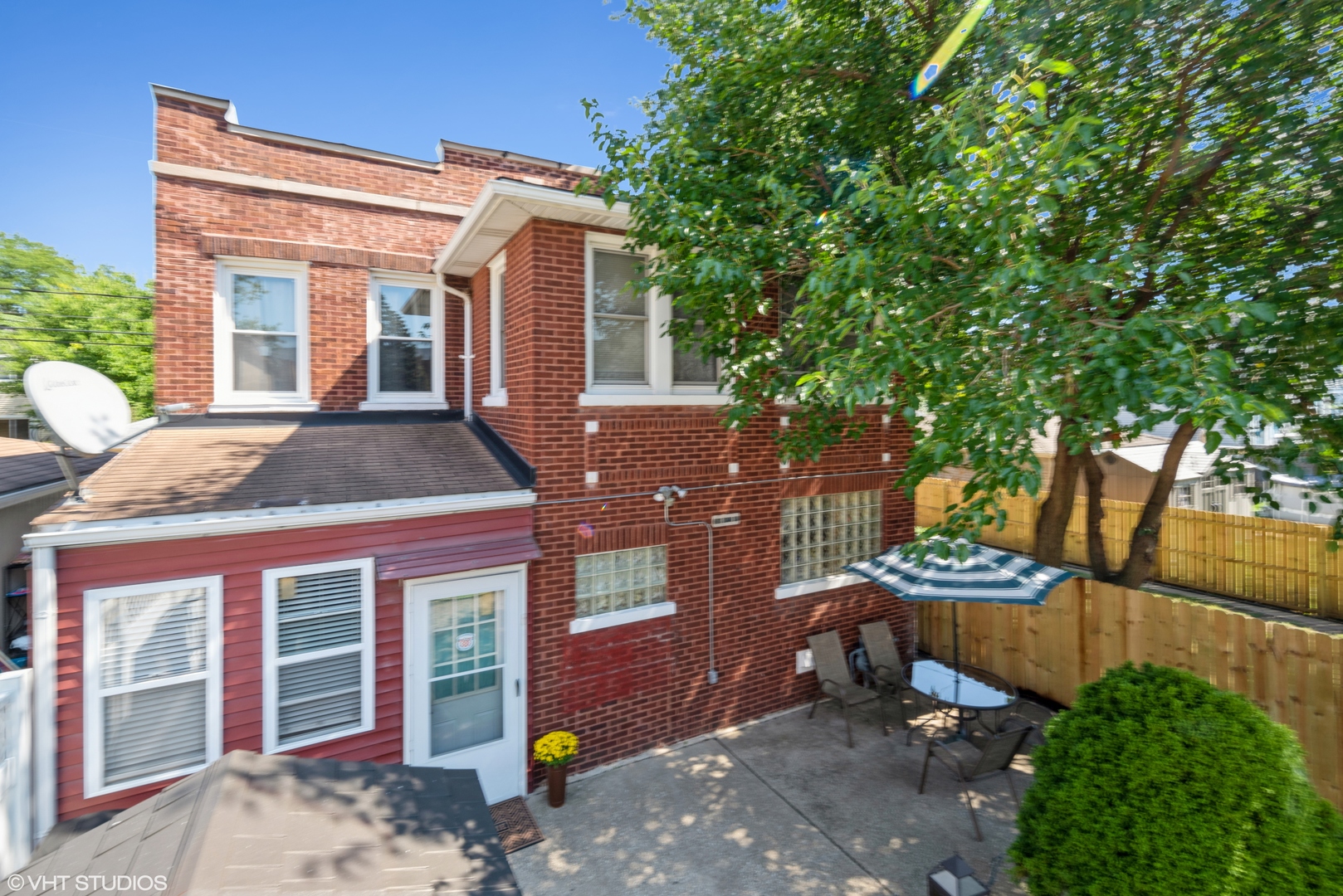 1309 Maple Avenue Berwyn, IL 60402 - Photo 1 of 17 a front view of a house with a tree
