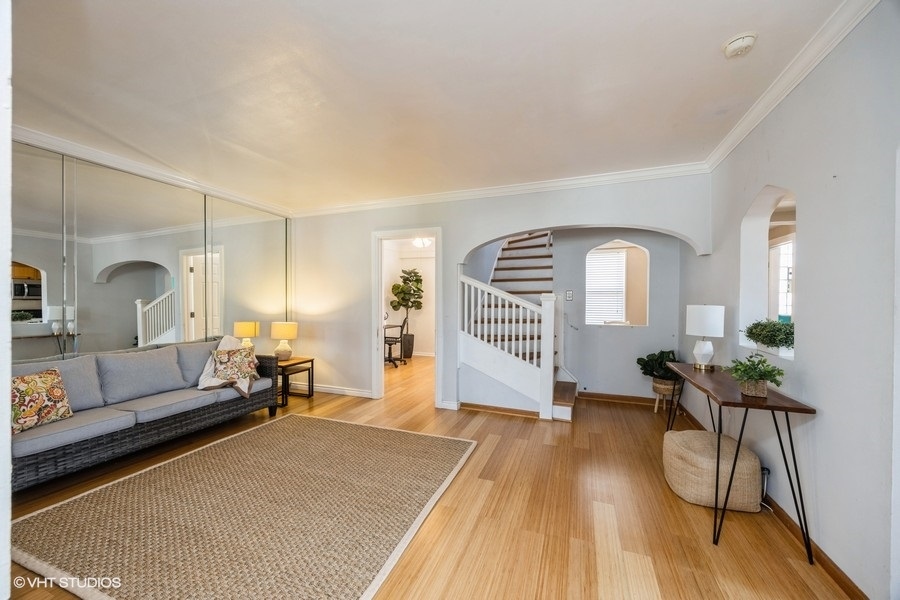 1309 Maple Avenue Berwyn, IL 60402 - Photo 3 of 17 a living room with furniture and a wooden floor