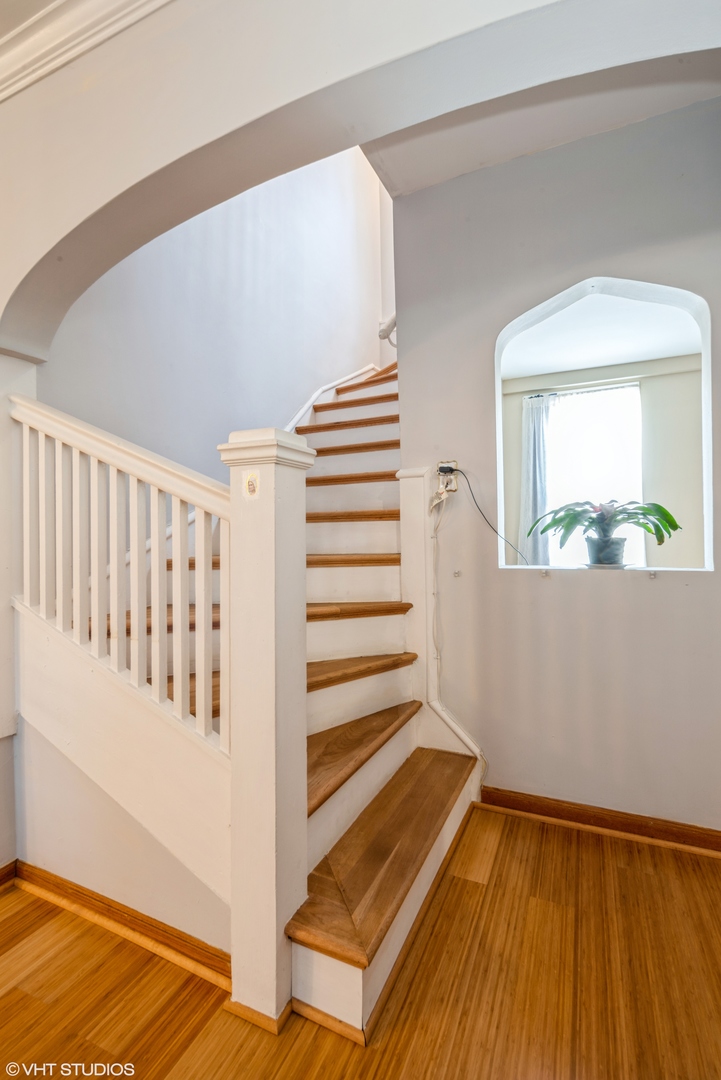 1309 Maple Avenue Berwyn, IL 60402 - Photo 5 of 17 a view of a room with wooden floor and cabinet