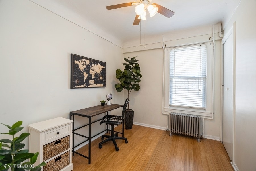 1309 Maple Avenue Berwyn, IL 60402 - Photo 10 of 17 a view of a livingroom with furniture and a window