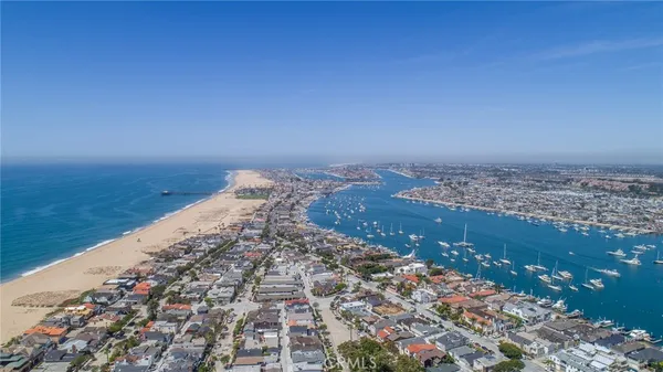 an aerial view of beach and ocean