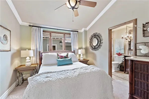 a bathroom with a granite countertop sink toilet a mirror and shower