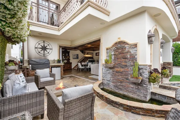 a view of a chairs and table in a patio