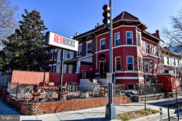 a front view of a building with street view