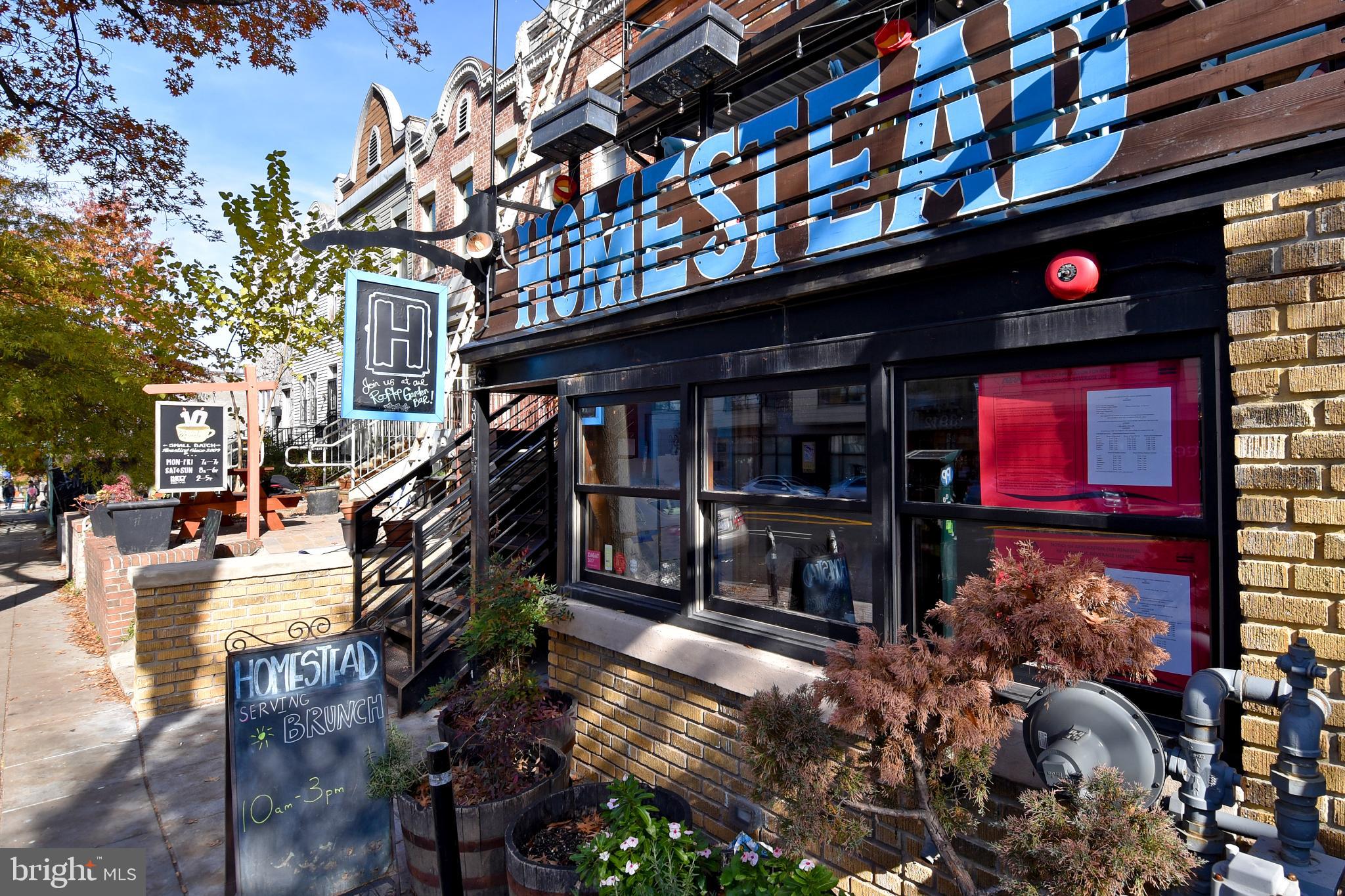 625 Park Road Northwest, Unit C8 Washington, DC 20010 - Photo 33 of 35 Charming eatery with inviting outdoor vibe.