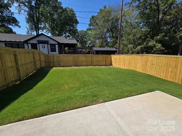 a view of a house with a garden