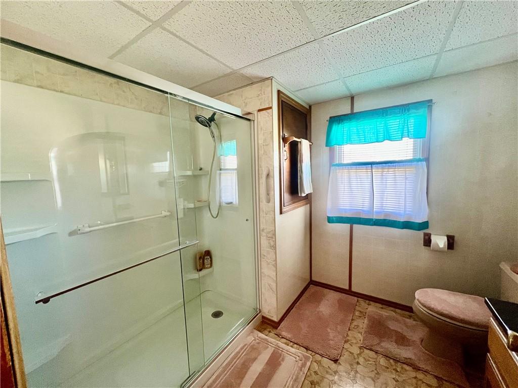 221 Expedite Road Twin Rocks, PA 15960 - Photo 15 of 27 a bathroom with a shower and toilet