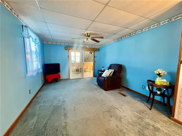 a room with furniture and window