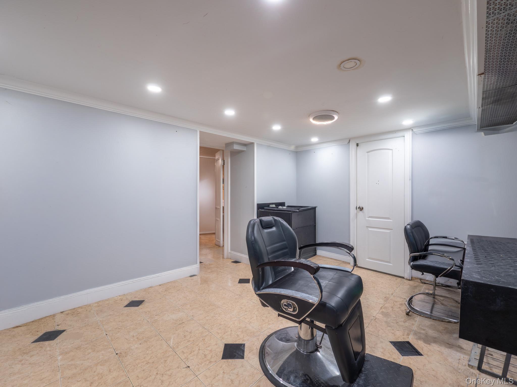 75-75 180th Street Queens, NY 11366 - Photo 31 of 48 a view of a room with gym equipment