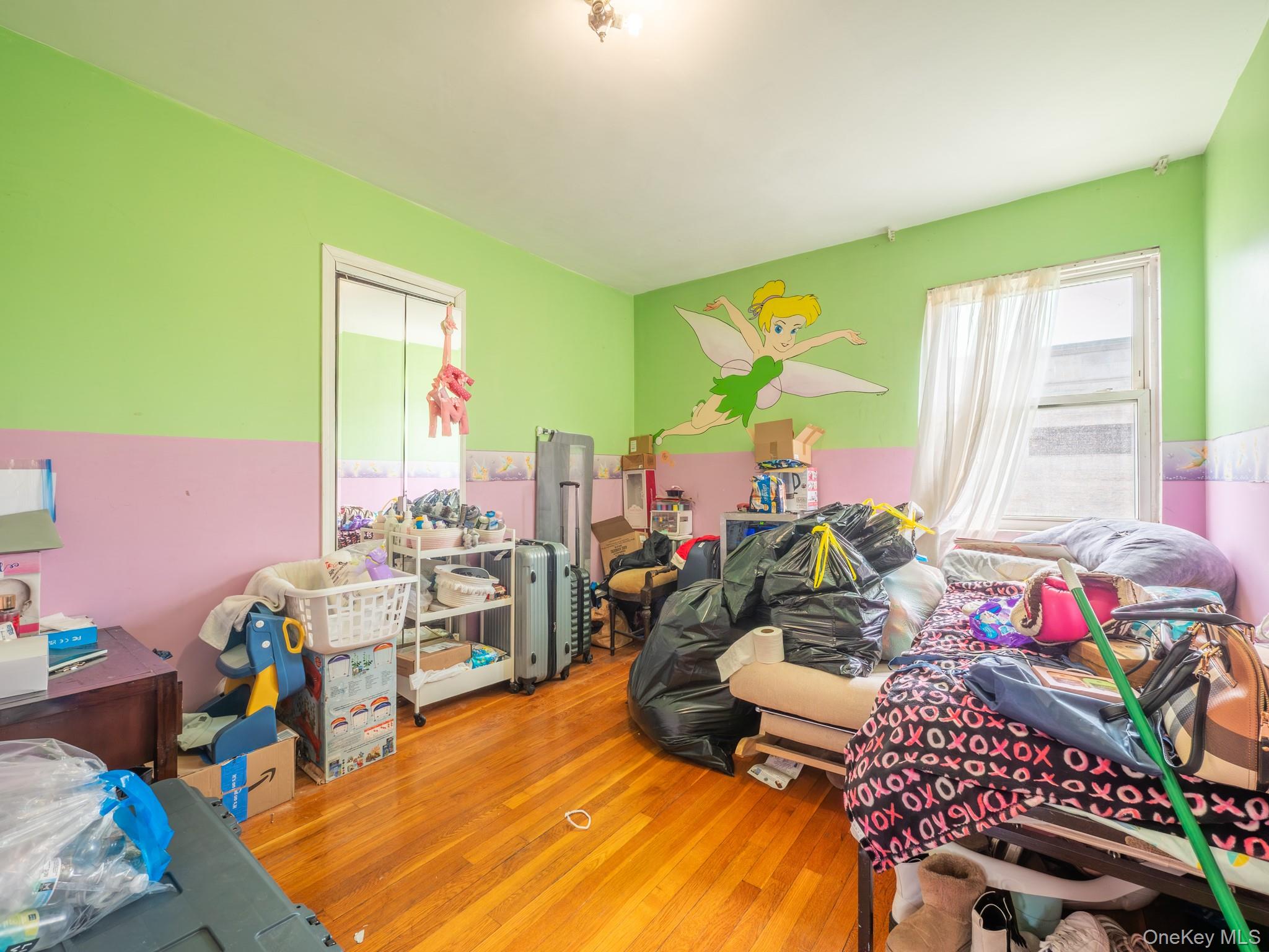 75-75 180th Street Queens, NY 11366 - Photo 46 of 48 a very nice looking room with a large window