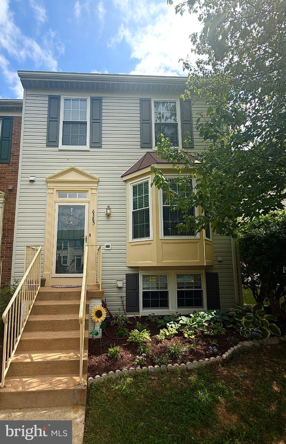 Charming home with inviting entrance.