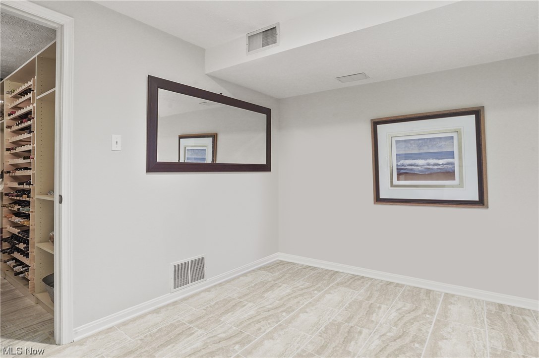 679 Sunridge Road Fairlawn, OH 44333 - Photo 33 of 40 Current owners use as a bar area. Could be an exercise space.