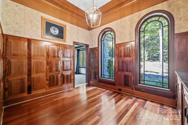 a view of empty room with ceiling fan
